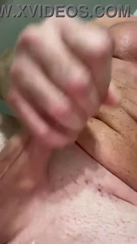 Desperate to cum, I rushed to a friend's place, only to be caught by his roommate. Unsettled but horny, I was ushered to a restroom and allowed to finish my business. The humiliation only fueled my arousal, leading to a satisfying release.