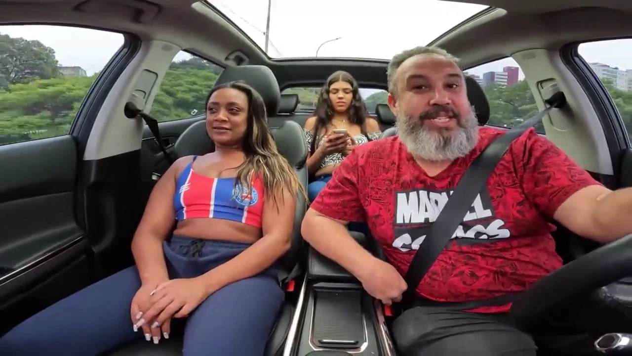 Sharon Citeli, a curvy mulatto with a big ass, gives a nice blowjob in a huge car porn video